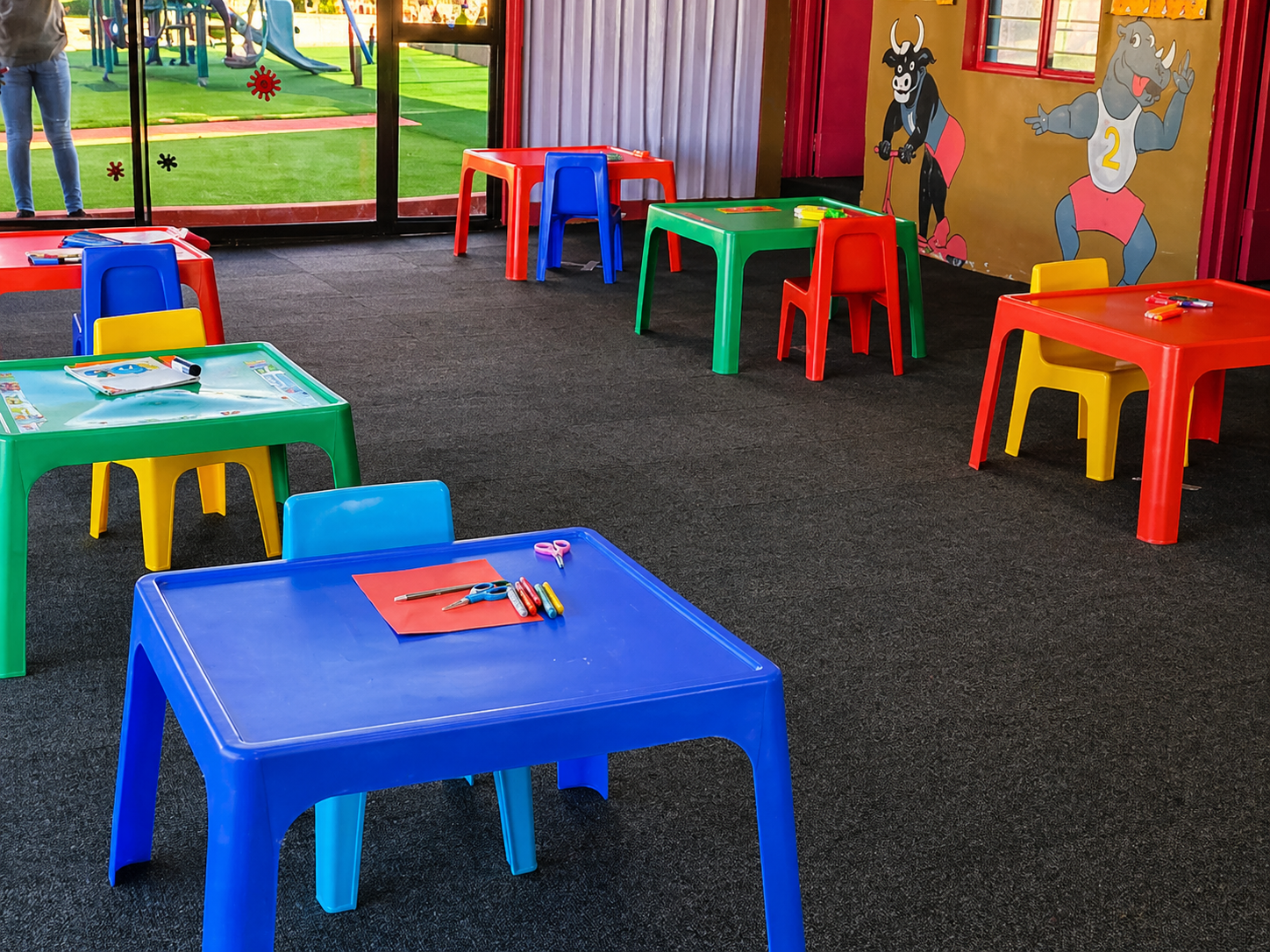 Modern preschool classroom with learning tools